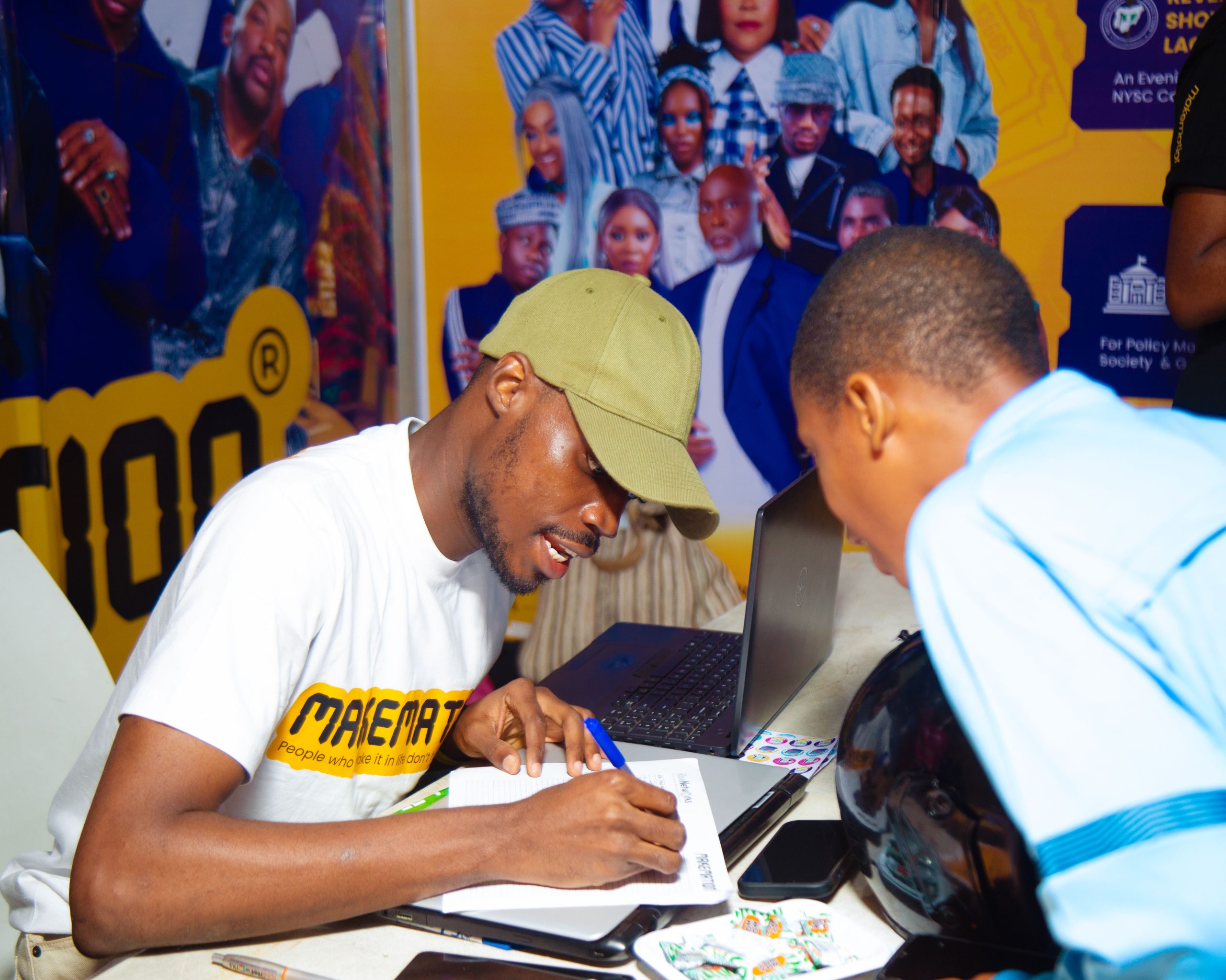 A MAKEMATION Team Rep attending to the Children @ STEM Africa Fest 2025